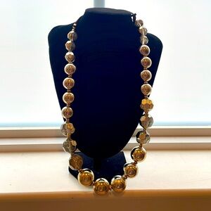 Women’s long gold ball necklace